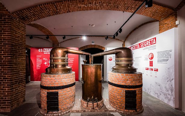 Copper distillation equipment at Casa Martini guided tour in Italy.