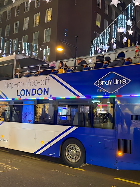 Open-top bus on London Christmas Lights Night Tour by Golden Tours.