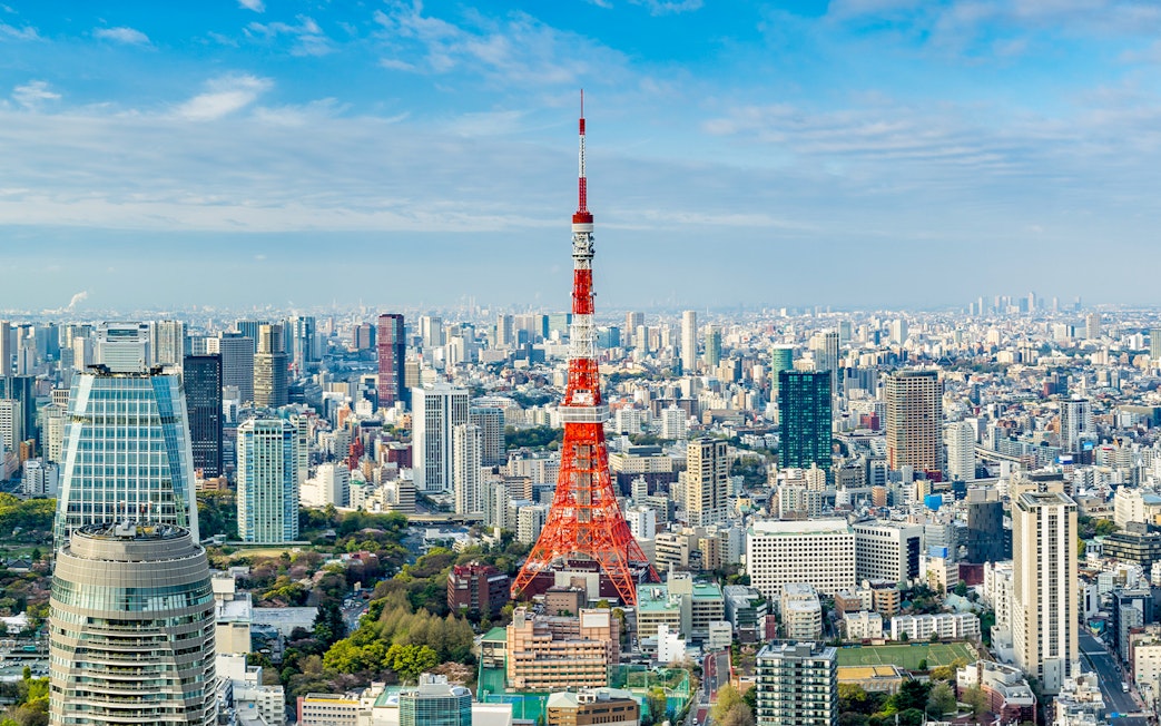 Tokyo Tower amidst cityscape, Tokyo, Japan.