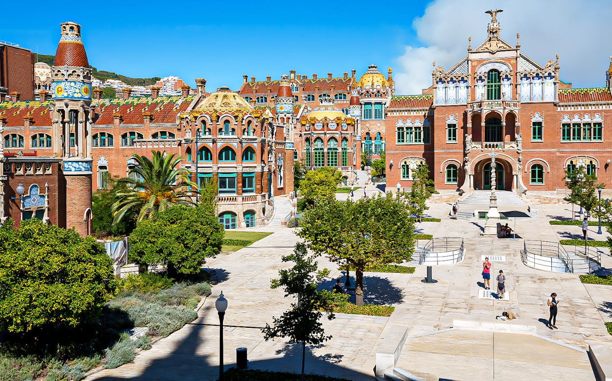 Sant Pau Modernista complex courtyard with ornate architecture in Barcelona, Spain.