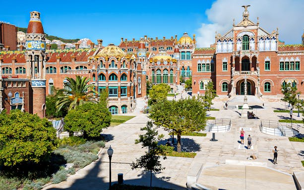 Sant Pau Modernista complex courtyard with ornate architecture in Barcelona, Spain.