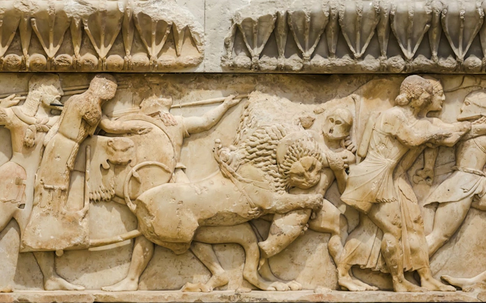 Ancient Greek relief depicting a battle scene inside Delphi Archaeological Museum.