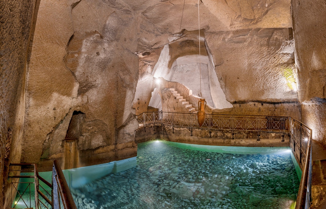 Redesigned Aqueducts in Naples underground ruins, featuring ancient Napoli sotterranea architecture.