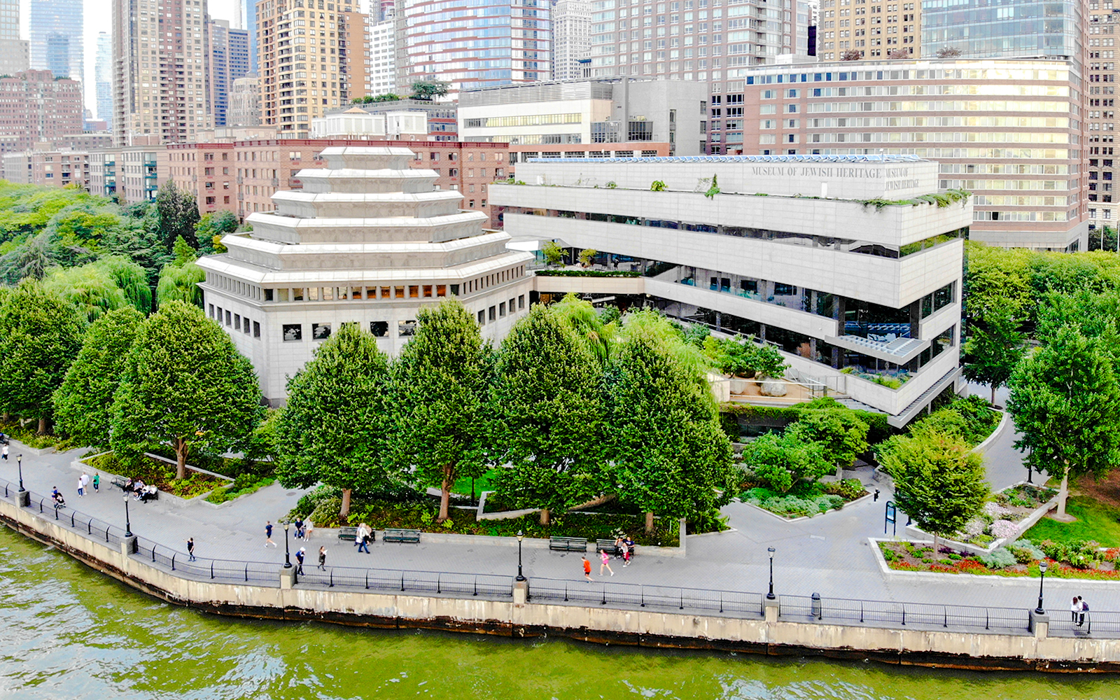 Aerial view of Museum of Jewish Heritage in Lower Manhattan with surrounding greenery.