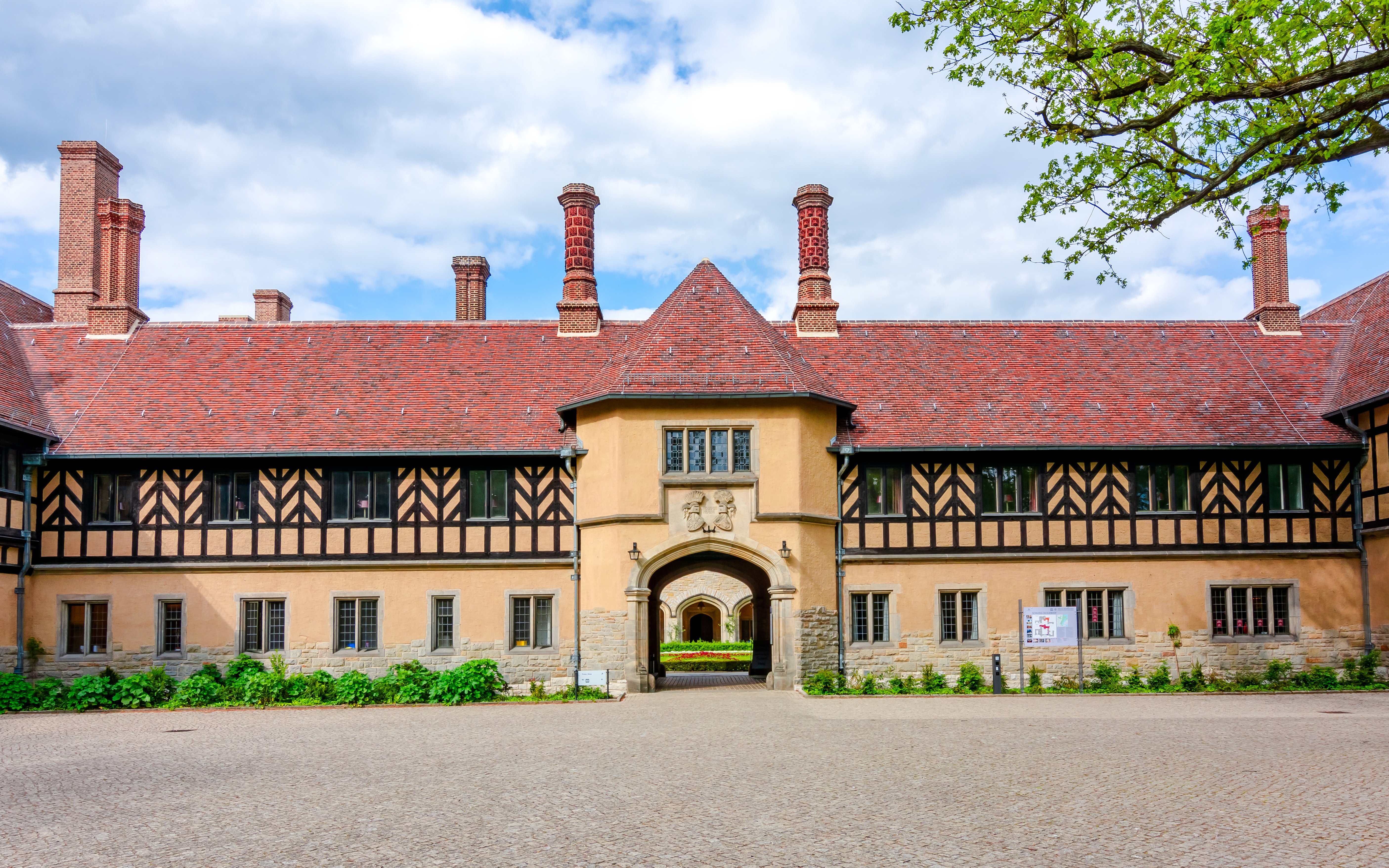 Cecilienhof Palace courtyard with Tudor-style architecture, Potsdam.