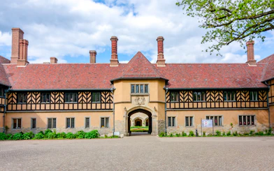 Cecilienhof Palace courtyard with Tudor-style architecture, Potsdam.