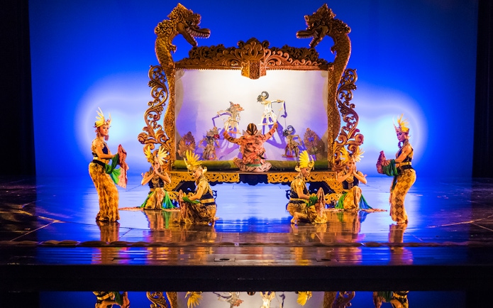 Performers at Devdan Show in Bali presenting Javanese shadow puppetry.