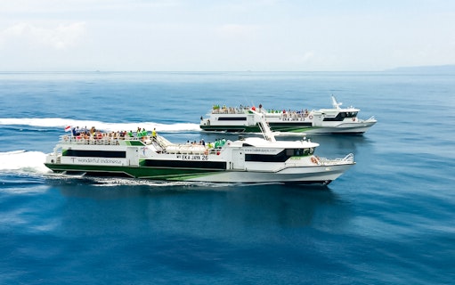 Fast ferries traveling from Padang Bay to Gili Islands, Indonesia.