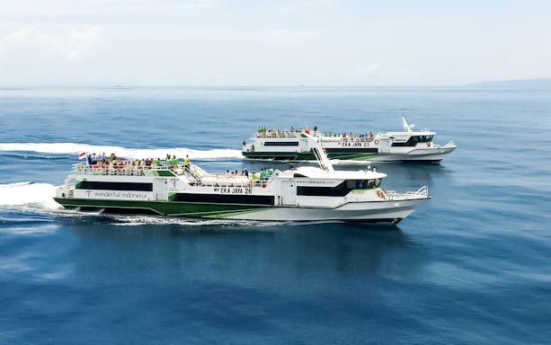 Fast ferries traveling from Padang Bay to Gili Islands, Indonesia.