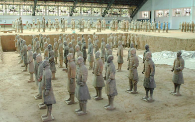 Terracotta Warriors in excavation pit at Xian Museum, part of Chengdu guided tour.