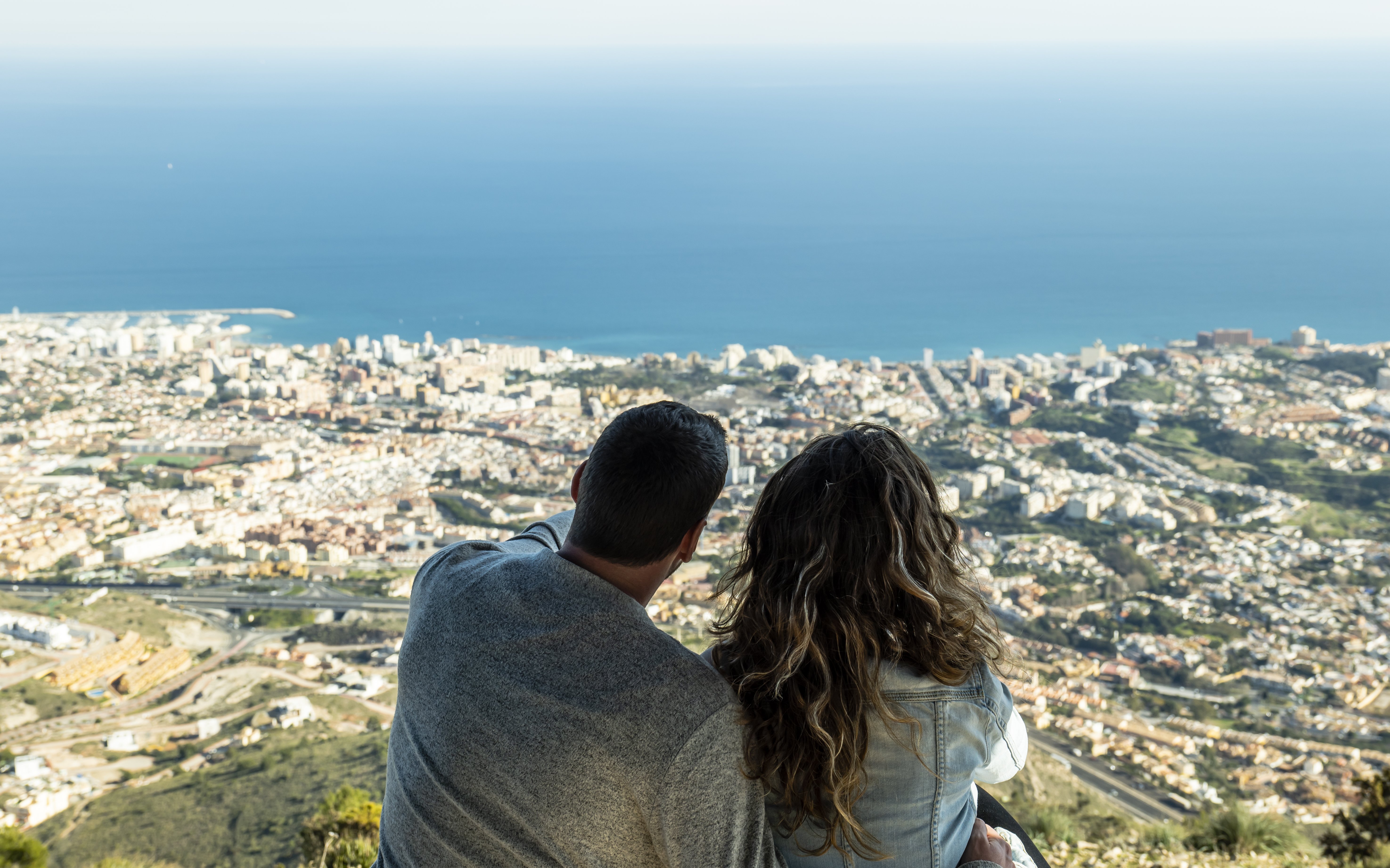 Couple enjoying panoramic view from Benalmadena cable car station, Malaga, Spain.