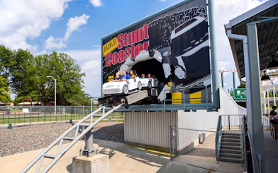 Riders on Backlot Stunt Coaster at Six Flags King's Dominion.