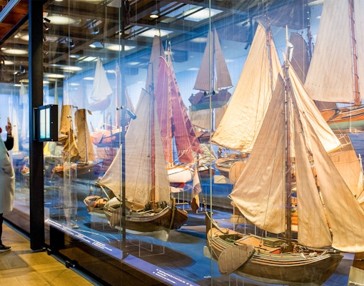 visitors observing yacht models exhibit at national maritime museum tickets