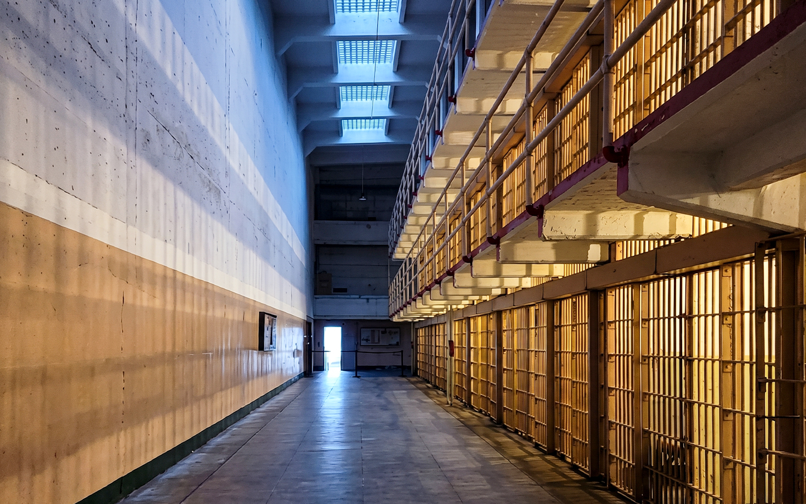 Alcatraz Island cell block corridor during evening tour.