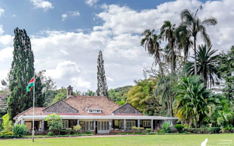 Historic Karen Blixen Museum in Nairobi surrounded by lush gardens.