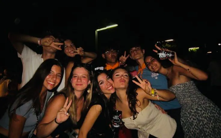 Group enjoying Barcelona nightlife with VIP club access and multi-bar visits.