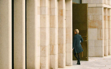 Kunsthaus Zurich entrance with person entering through large door.