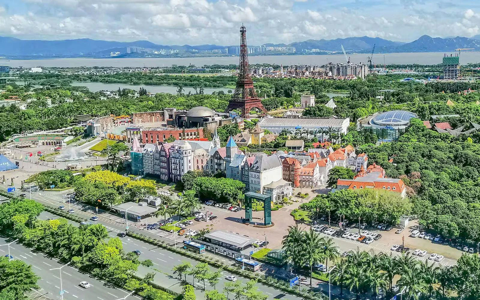 Aerial view of Window of the World theme park in Shenzhen, China, featuring global landmarks.