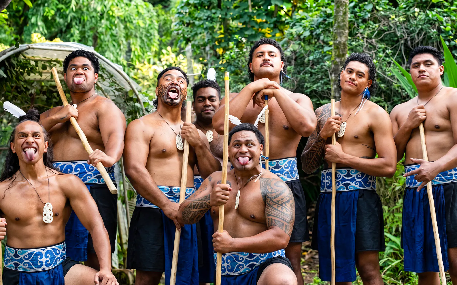Polynesian men performing traditional haka at Toa Luau, Hawaii.
