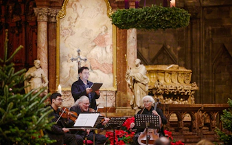 Musicians performing at a Christmas concert inside St. Stephen's Cathedral, Vienna.