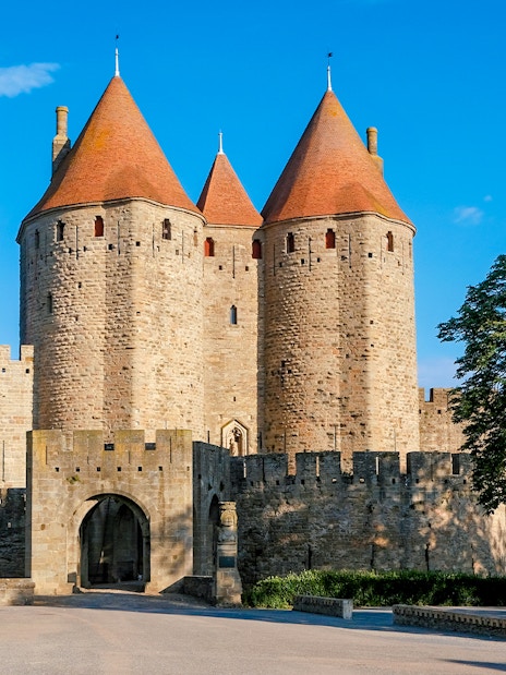 Carcassonne Castle Narbonne Gate with stone towers and medieval walls.