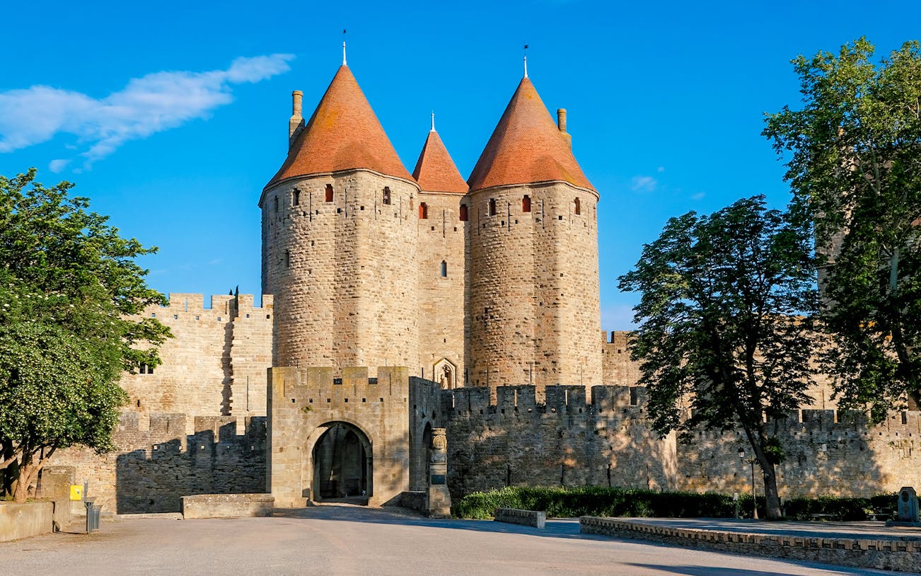 Carcassonne Castle Narbonne Gate with stone towers and medieval walls.