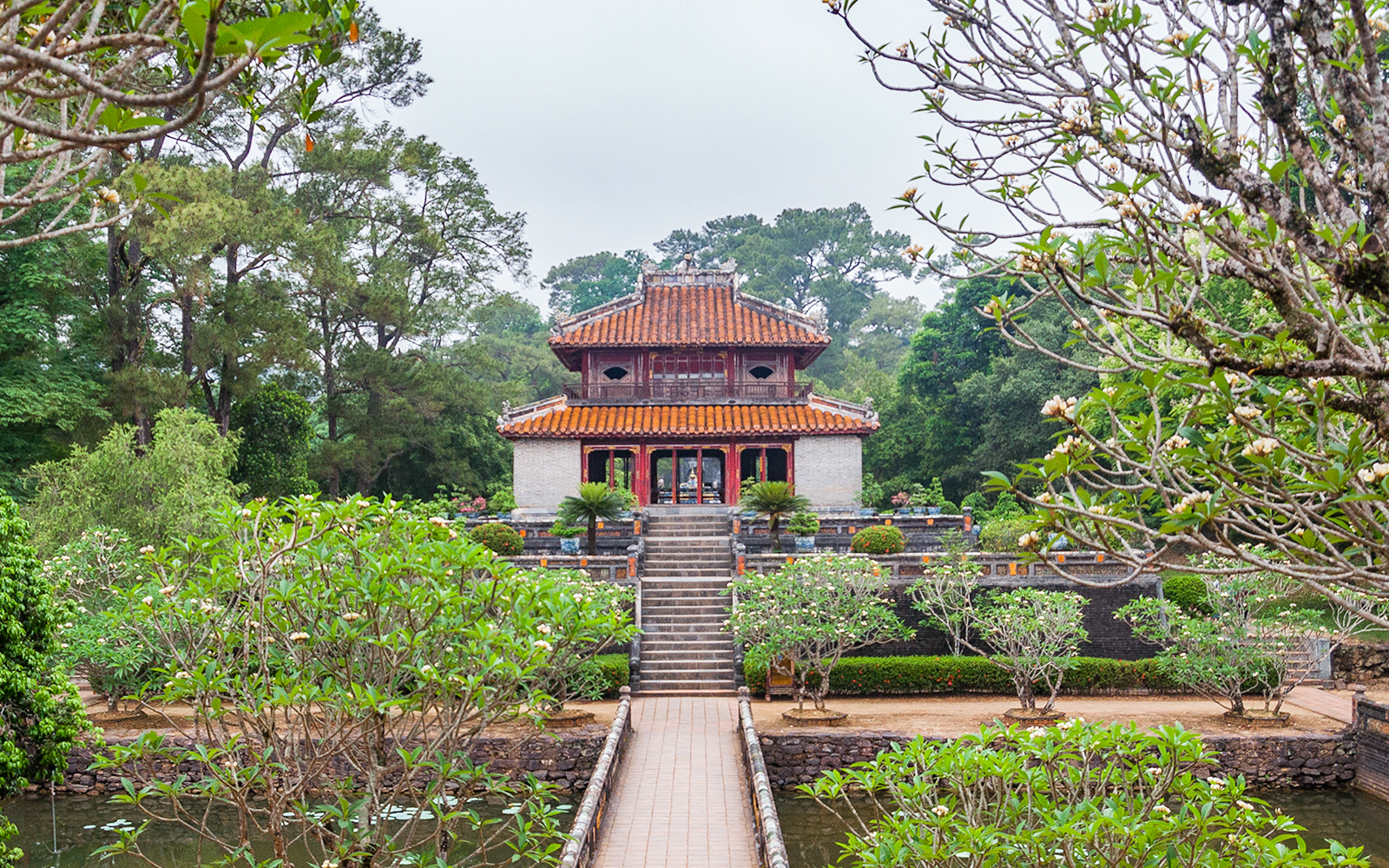 Tomb of Emperor Khai Dinh surrounded by lush gardens in Hue, Vietnam.