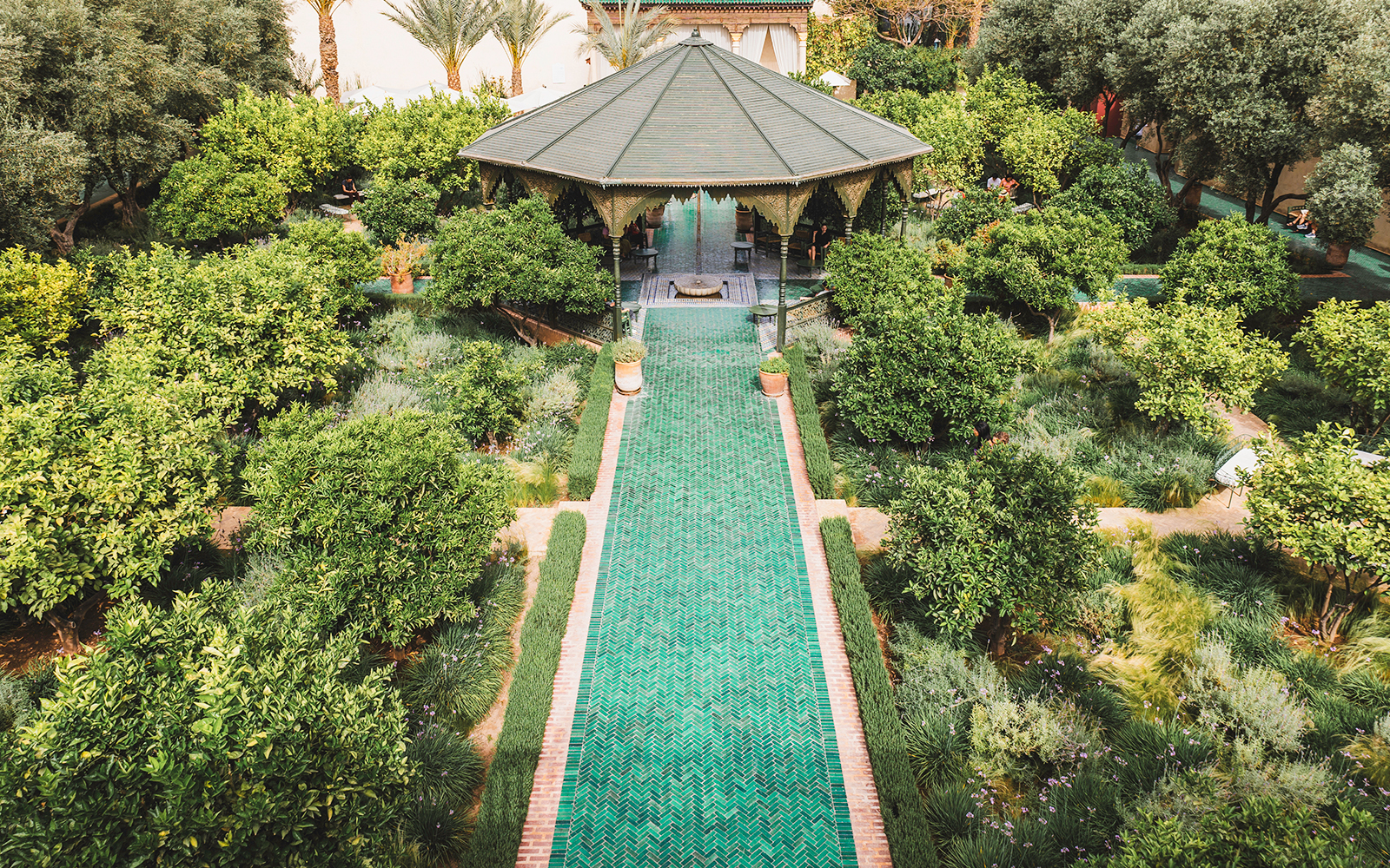 Jardin Secret garden with pavilion and green pathway in Marrakech, Morocco.