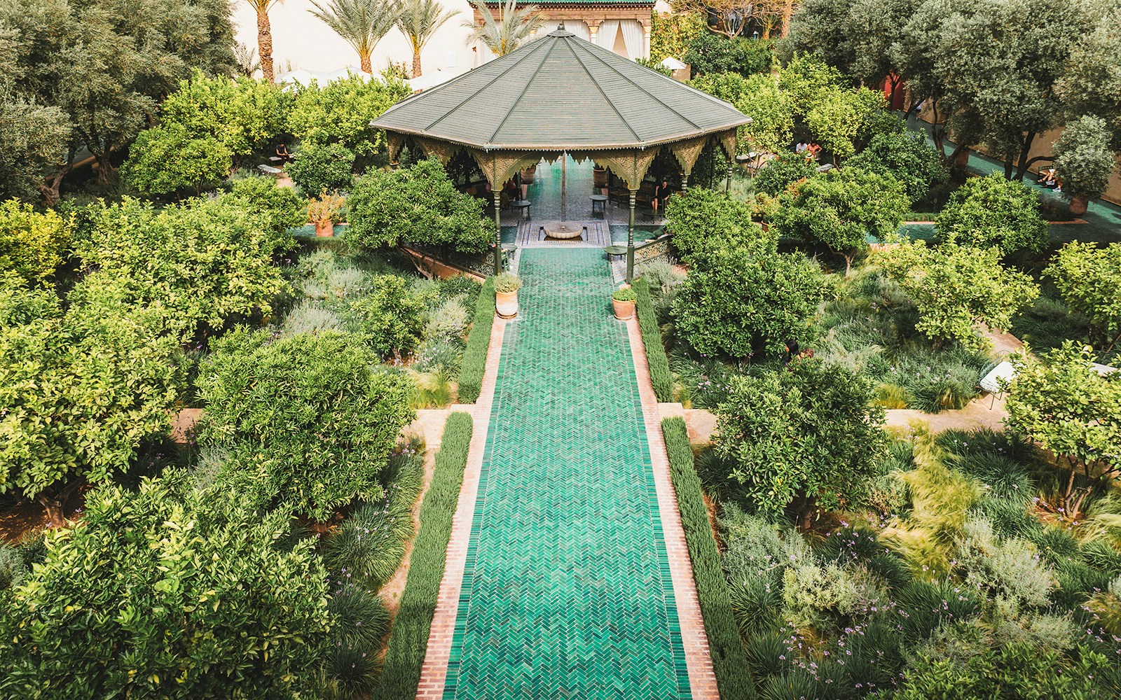 Jardin Secret garden with pavilion and green pathway in Marrakech, Morocco.