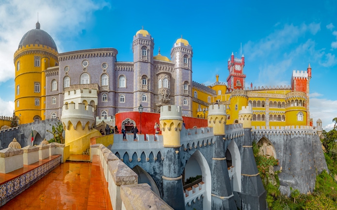 Pena Palace in Sintra, Portugal, showcasing colorful architecture and intricate details.
