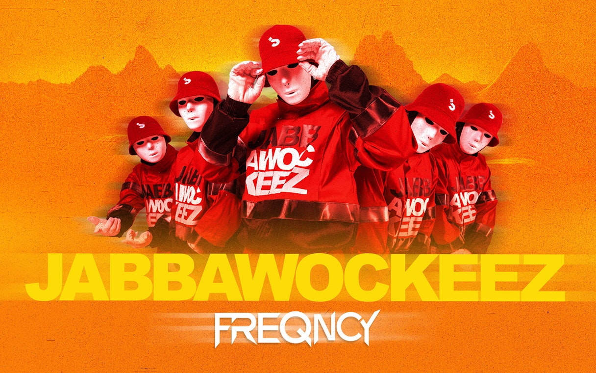Jabbawockeez dancers in red outfits and masks promoting Vegas show.