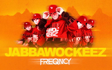 Jabbawockeez dancers in red outfits and masks promoting Vegas show.