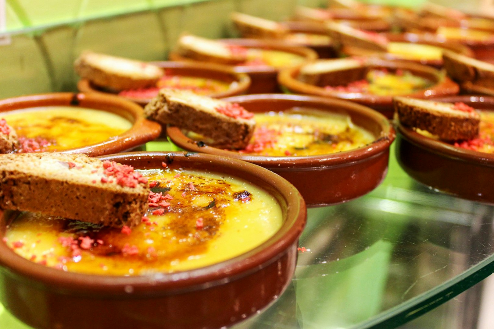 Crema catalana desserts with biscotti at Tablao Cordobes.