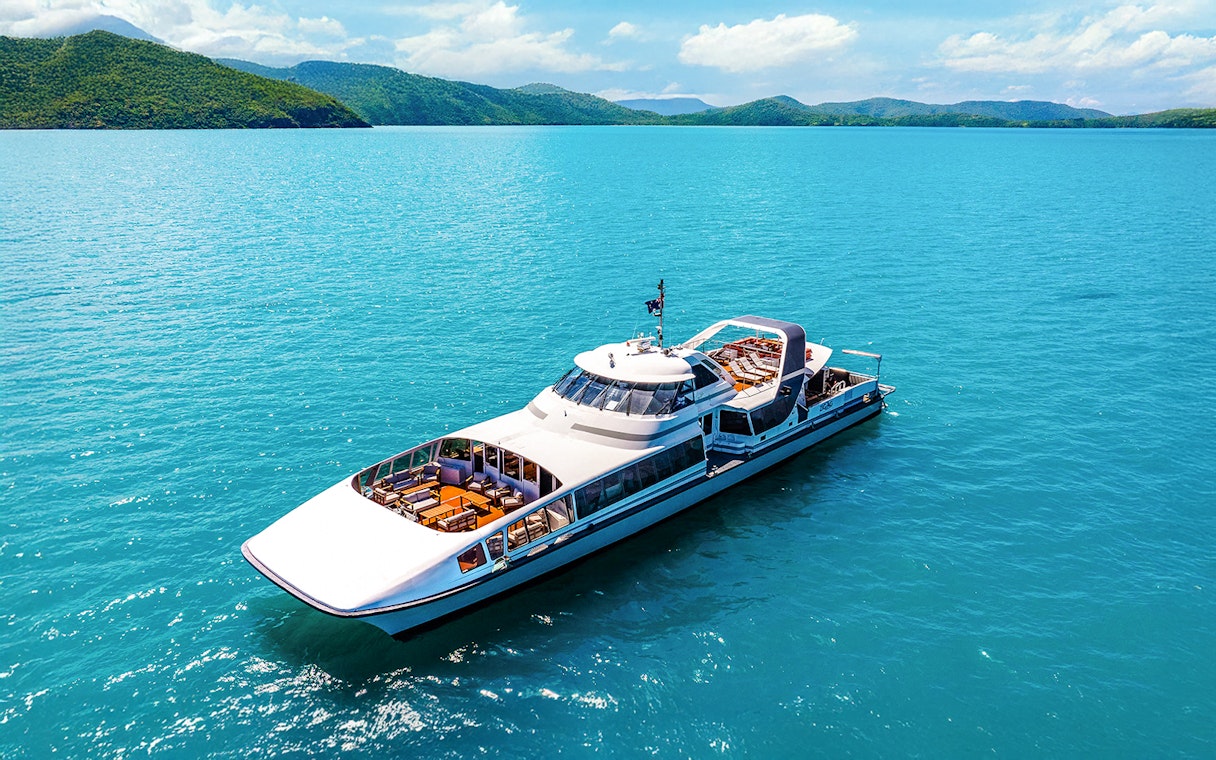 Catamaran cruising in Whitsundays on ZigZag Day Tour, Australia.