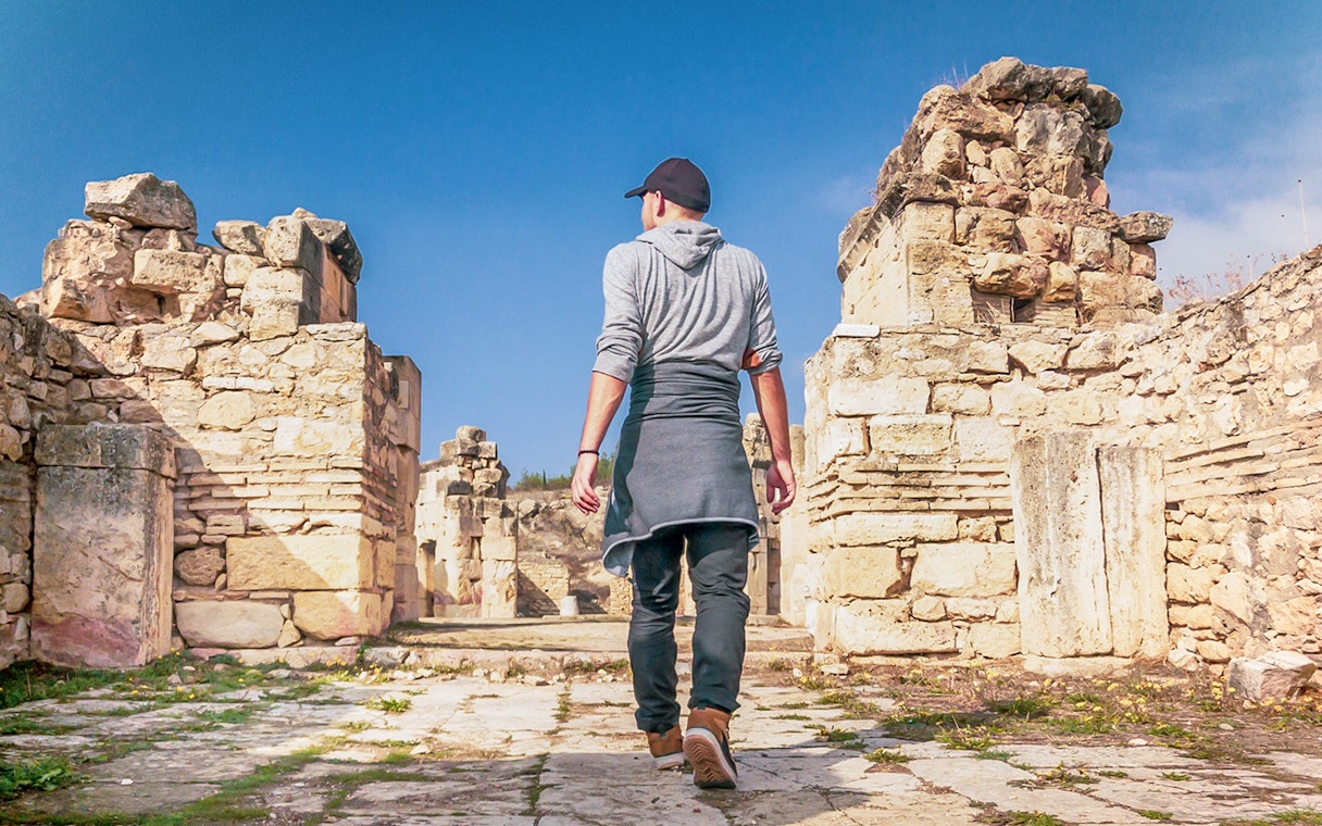 Guest walking through ancient ruins of Hierapolis, Turkey.