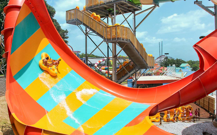 Visitors on a water slide at Six Flags Over Georgia.