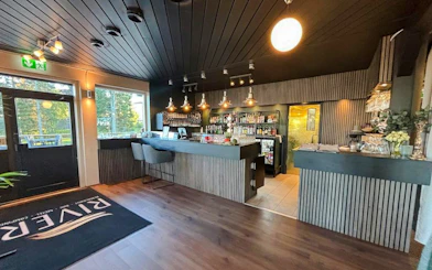 Restaurant interior with bar seating during lunch for Icebreaker Cruise & Ice Floating Experience.