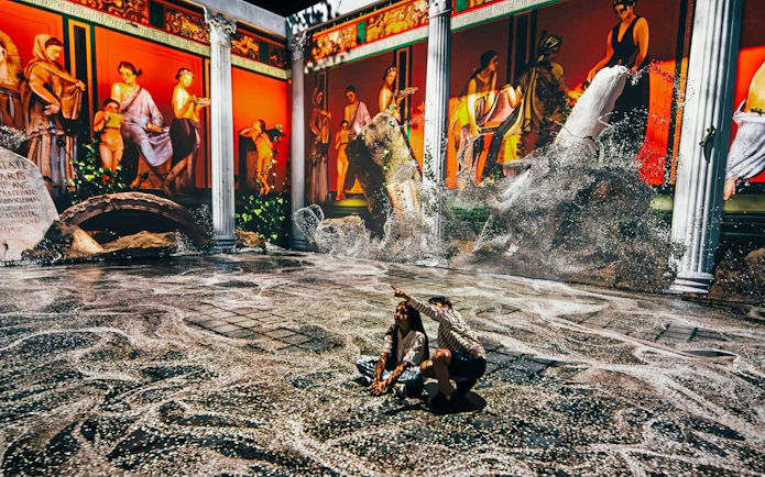 Immersive Pompeii show with ancient frescoes and volcanic eruption at IDEAL Barcelona