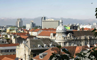 Zagreb cityscape with historic architecture and modern buildings, view from a self-guided city exploration game.