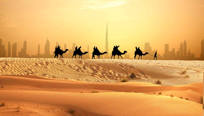Burj Khalifa view with Dubai desert safari in the foreground.