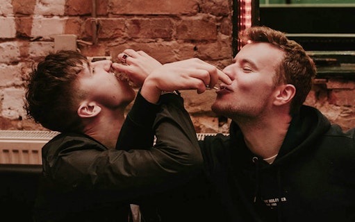 Two people enjoying drinks on the Budapest Tipsy Tour.