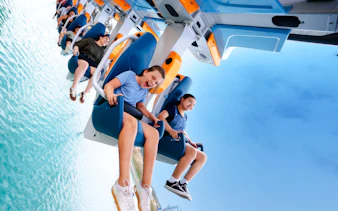 Riders enjoying the Barracuda Strike ride at SeaWorld San Antonio.