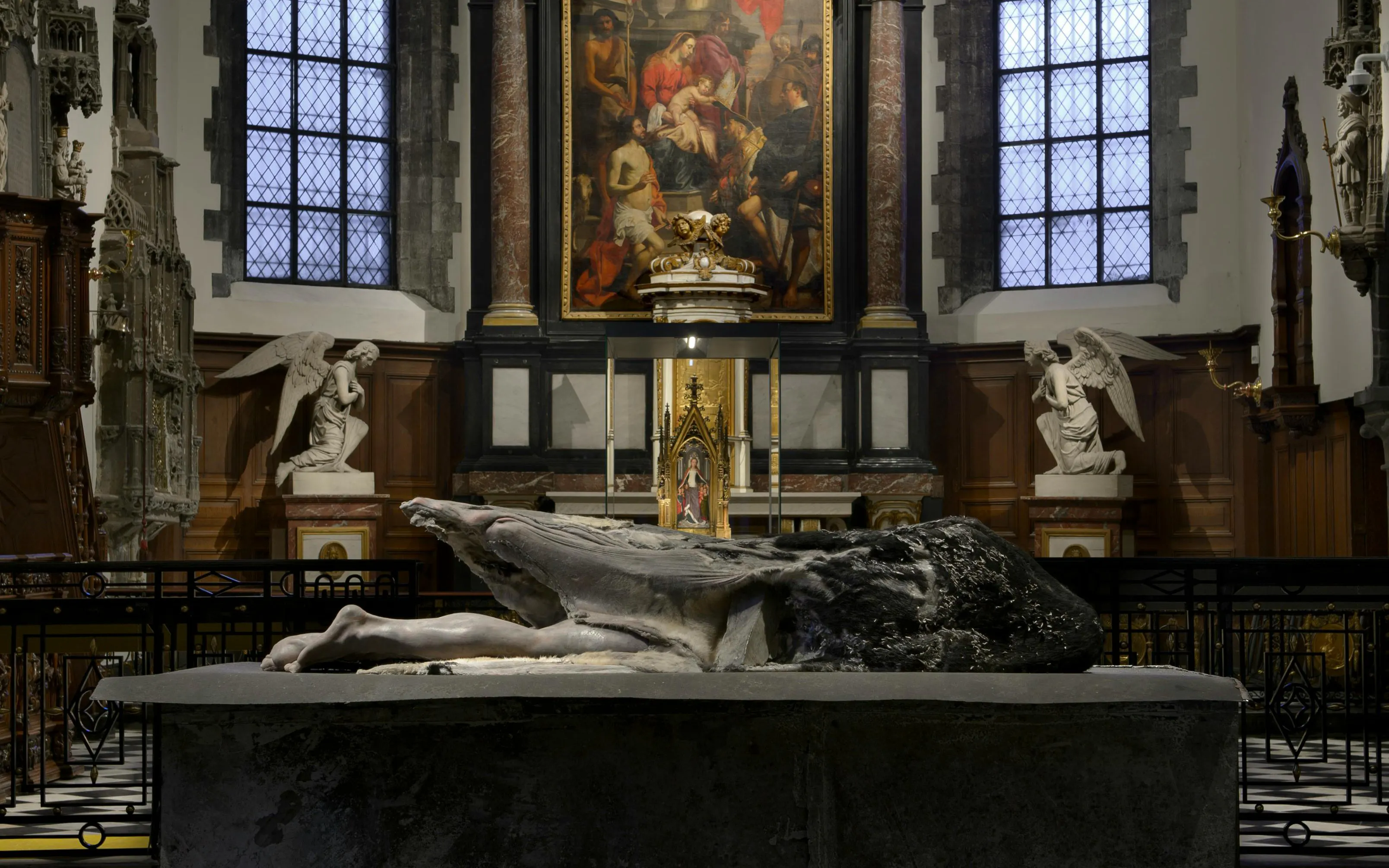 Sculpture and religious artwork inside Museum Sint-Janshospitaal, Bruges.