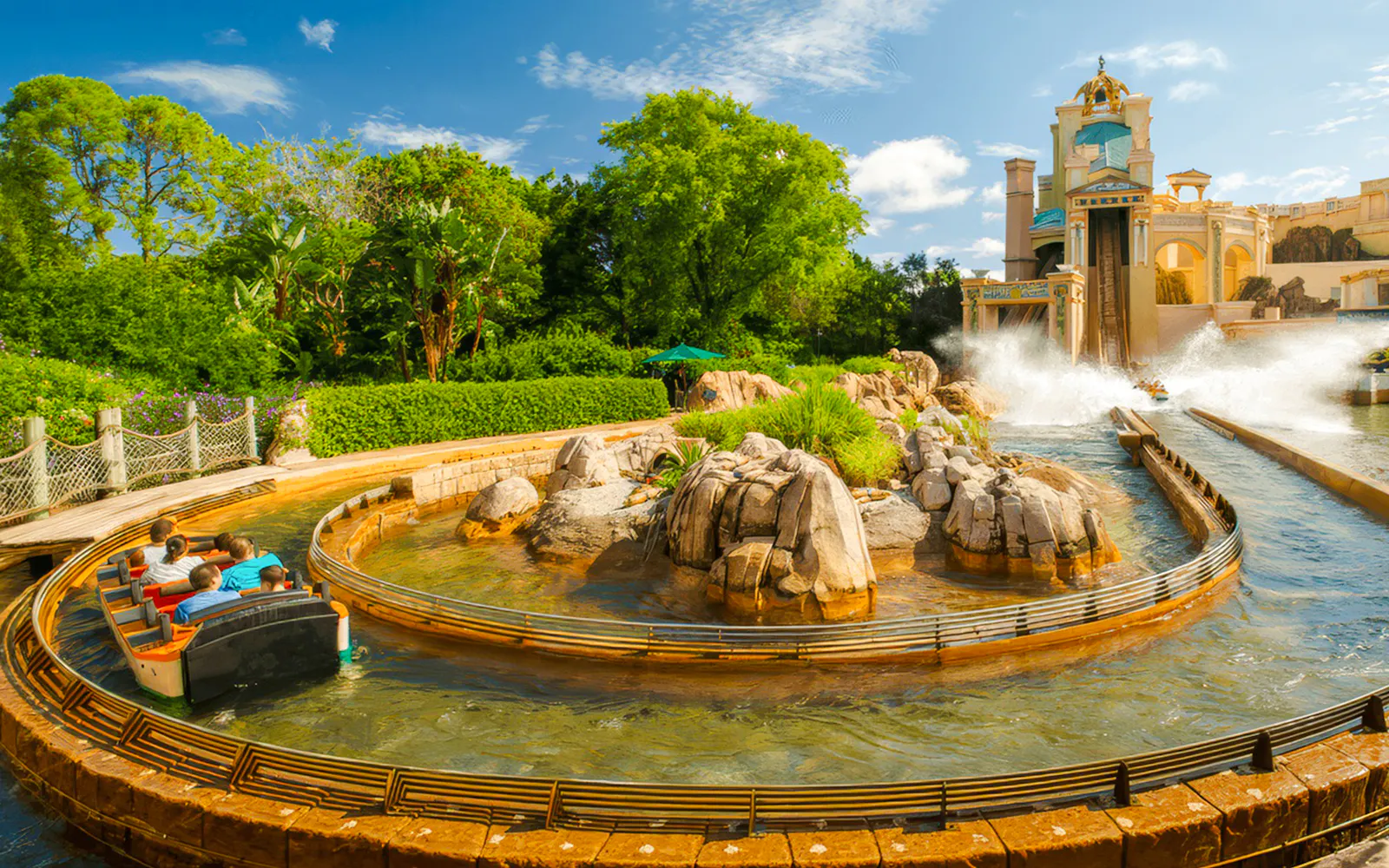 Journey to Atlantis water ride at SeaWorld Orlando with boat on winding track.