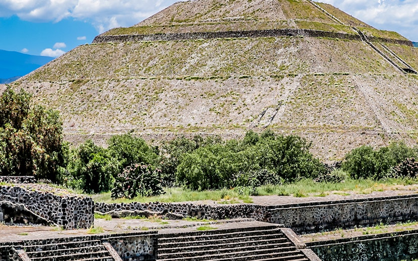 Teotihuacán Pyramid with tourists exploring the ancient site in Mexico City.