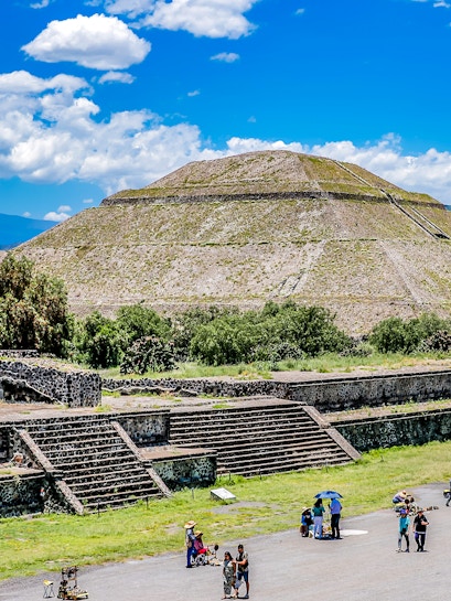 Teotihuacán Pyramid with tourists exploring the ancient site in Mexico City.