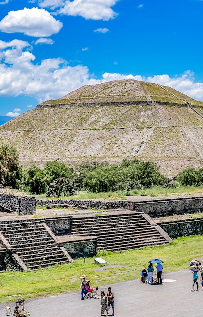 Teotihuacán Pyramid with tourists exploring the ancient site in Mexico City.