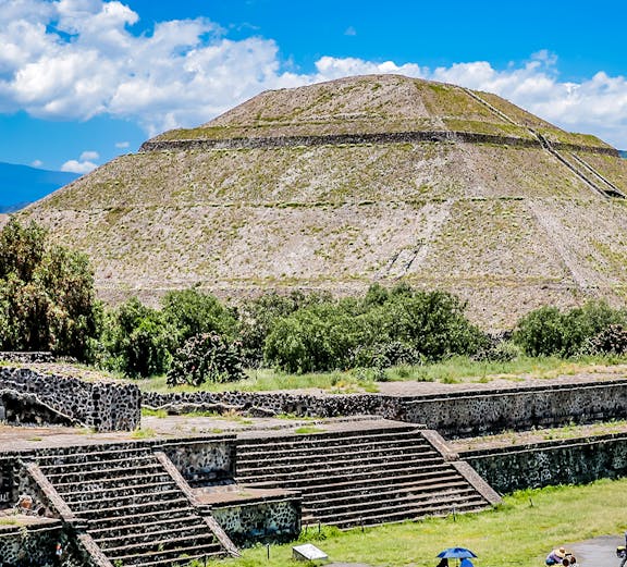 Teotihuacán Pyramid with tourists exploring the ancient site in Mexico City.