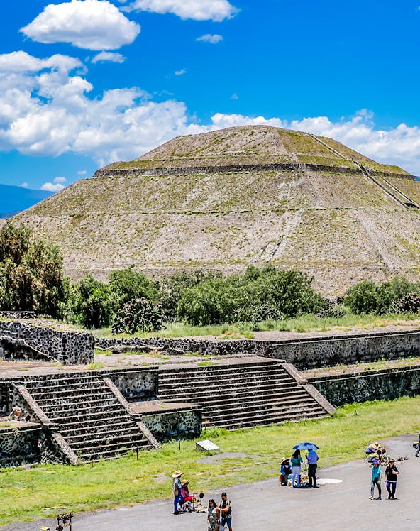 Teotihuacán Pyramid with tourists exploring the ancient site in Mexico City.