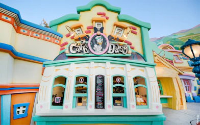 Cafe Daisy entrance with colorful facade at Disneyland Park, California.